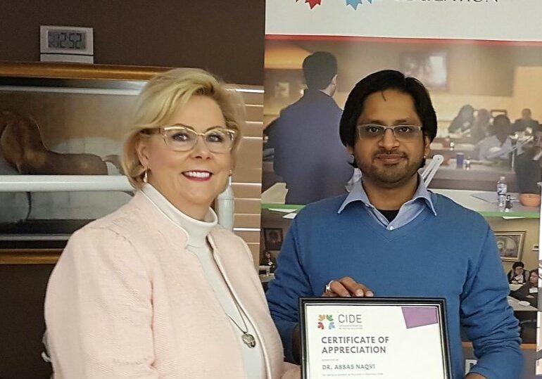Sandy and Dr. Abbas with Certificate Award